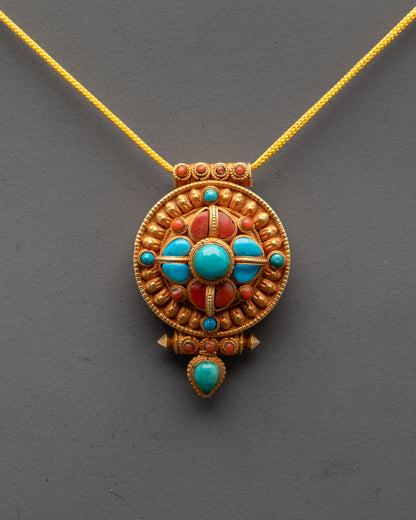 Close-up of intricately carved Tibetan pendant featuring turquoise and coral accents
