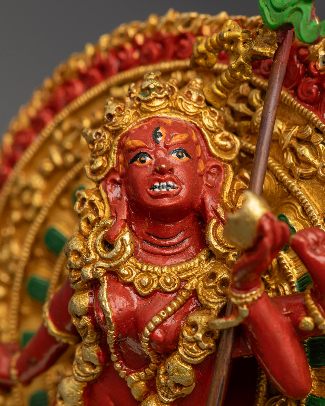 machine-made Flying Vajrayogini statue showing intricate vajra and skull cup symbols on lotus throne.