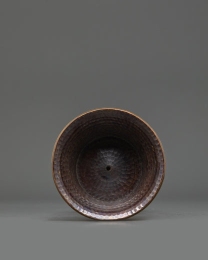 Close-up of ornate Copper Brass Butter Lamp showing detailed Buddhist craftsmanship