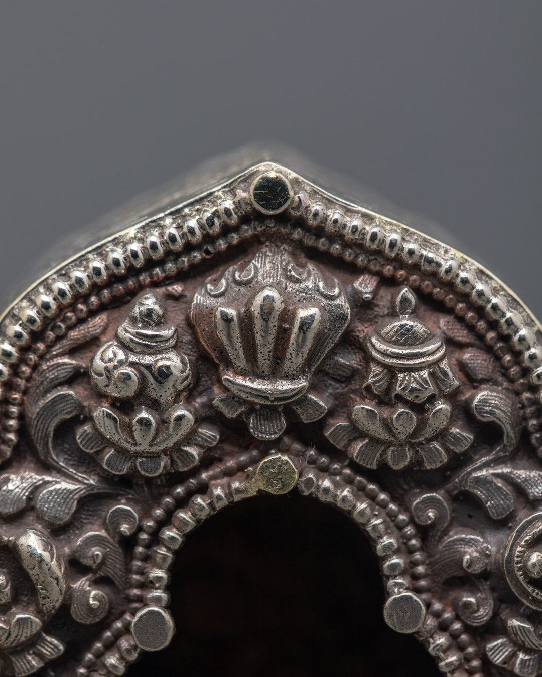 Close-up of the central hollow chamber in the Ghau prayer box, designed for sacred mantras