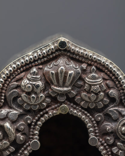 Close-up of the central hollow chamber in the Ghau prayer box, designed for sacred mantras