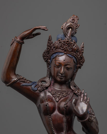 Close-up of the oxidized copper Mayadevi Statue showing traditional Nepalese