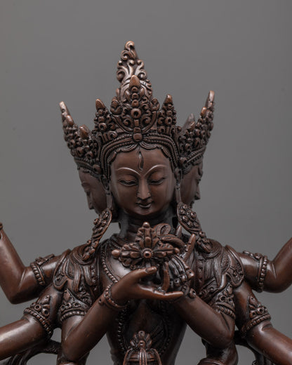 Close-up of the oxidized copper Namgyalma statue showing fine craftsmanship