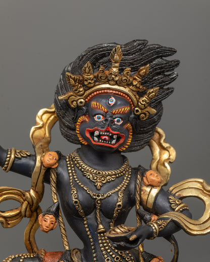 Close-up of wrathful Singha Mukha Statue showing detailed facial expression