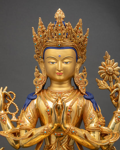 Close-up showing intricate 3D carvings, gold-painted face, and jewelry details on Chenrezig