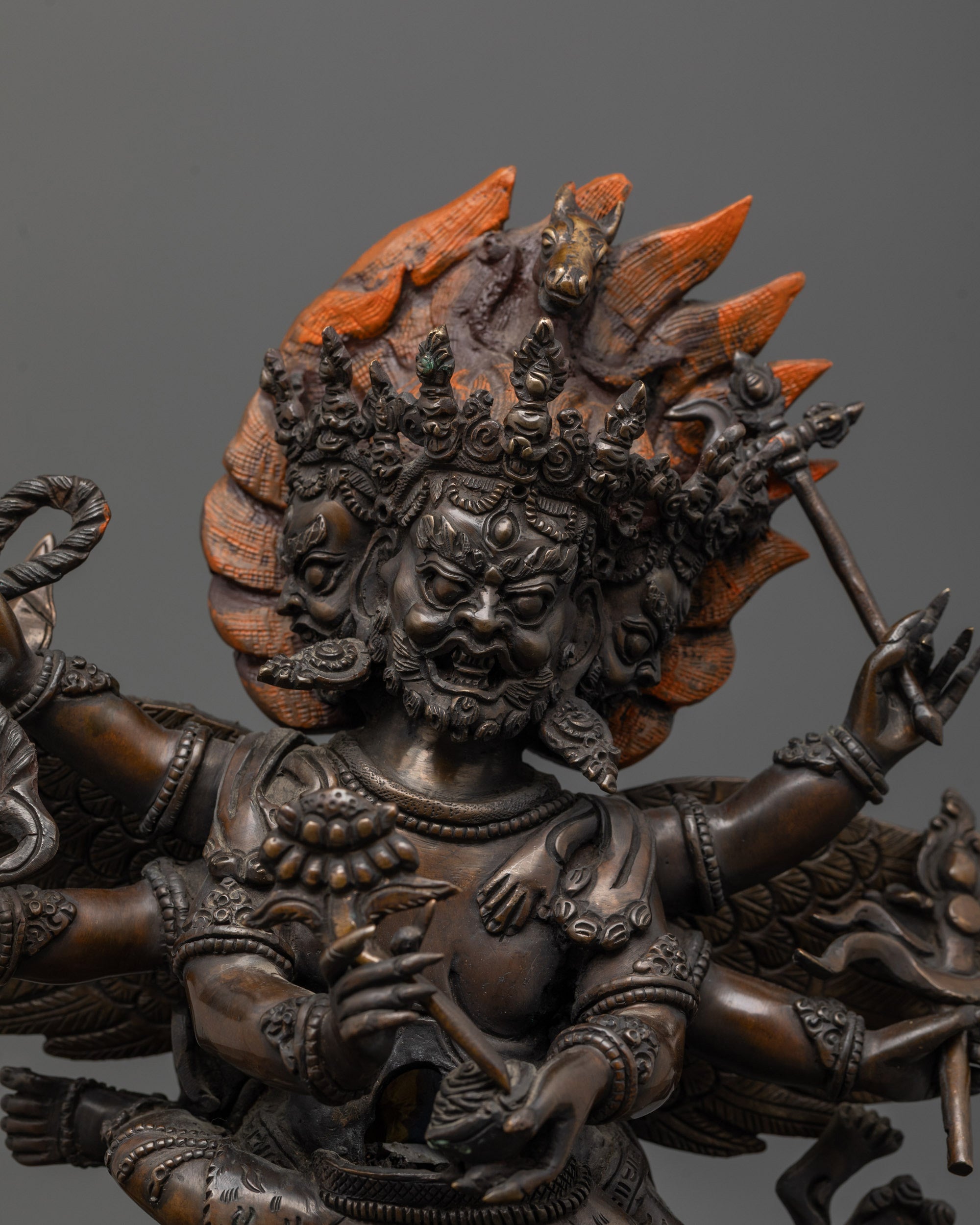 Close-up side angle of the Hayagriva statue showcasing intricate detailing
