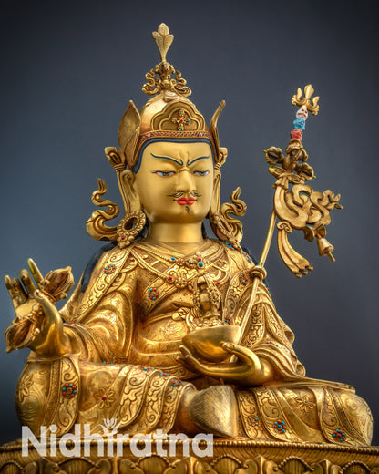 Close-up Lower side view of Guru Padmasambhava statue with lotus hat and five-petal crown