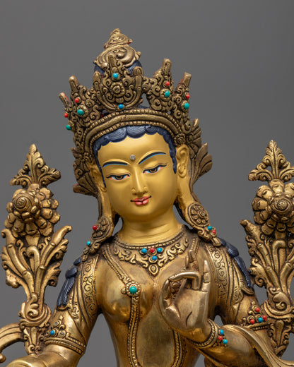 the Green Tara's serene expression and intricate details, showcasing the craftsmanship.