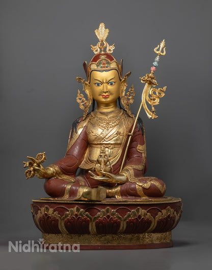 Guru Rinpoche (Padmasambhava) Statue highlighting the gold fire gilded body and intricately crafted face made from precious stones.