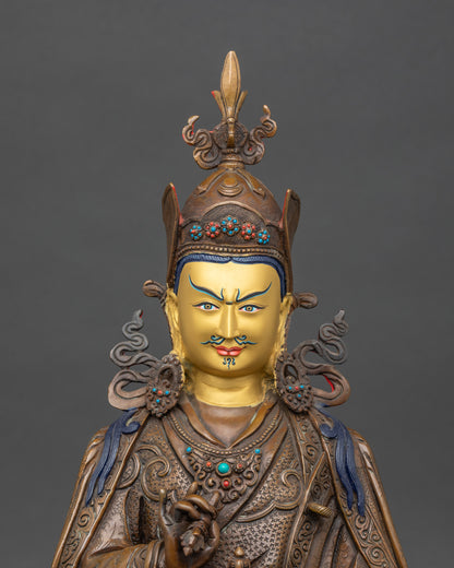 Close-up view of the Tsokye Dorje statue highlighting oxidized copper textures and finely detailed robes.