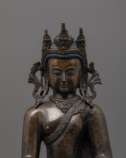 Close up 24k gold fire-gilded Shakyamuni Buddha sculpture holding monk's bowl