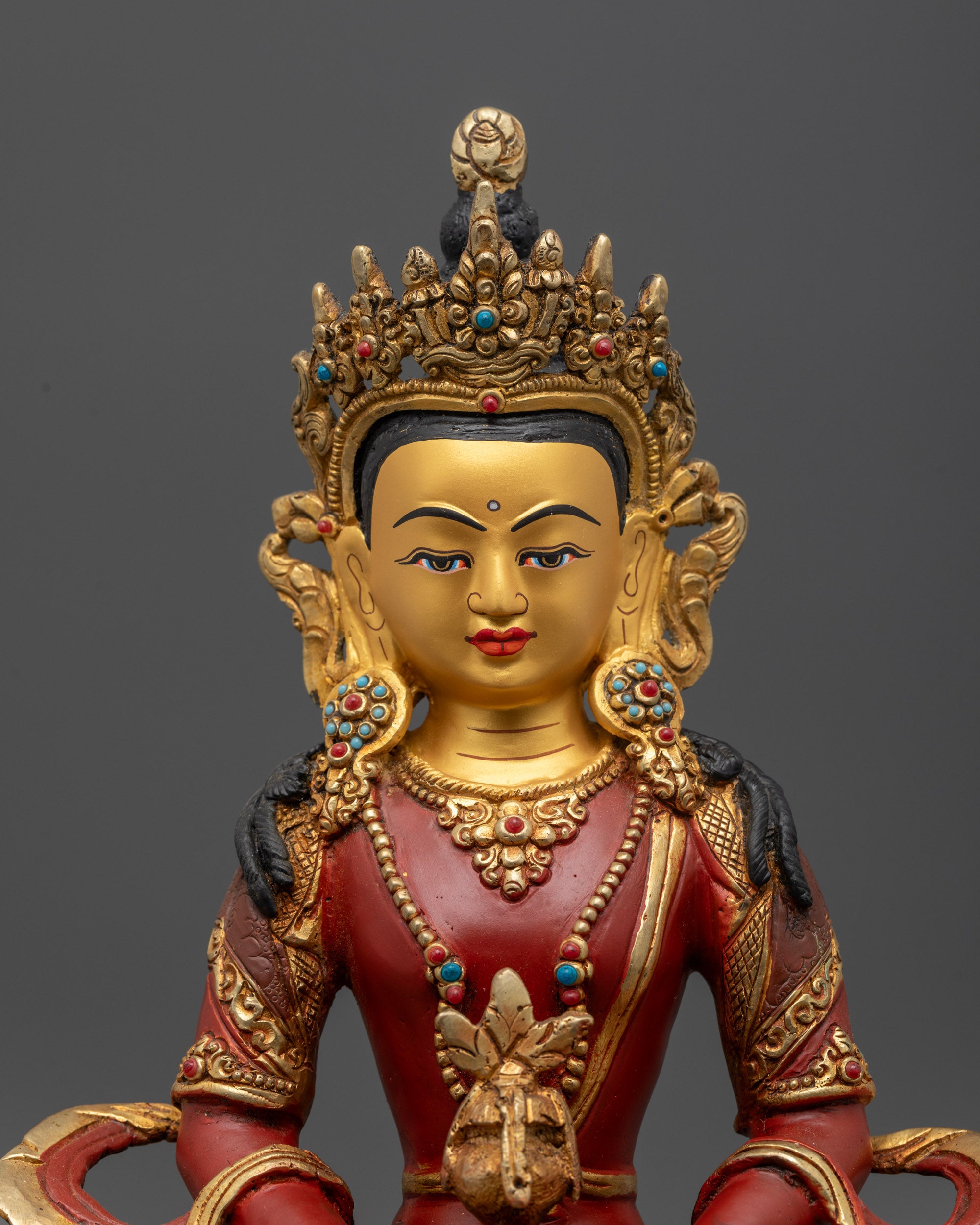 Close up Amitayus Sculpture gold-plated nectar vase and gemstone robe
