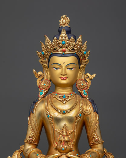 Close up Amitayus gold-gilded face with jeweled crown and serene expression