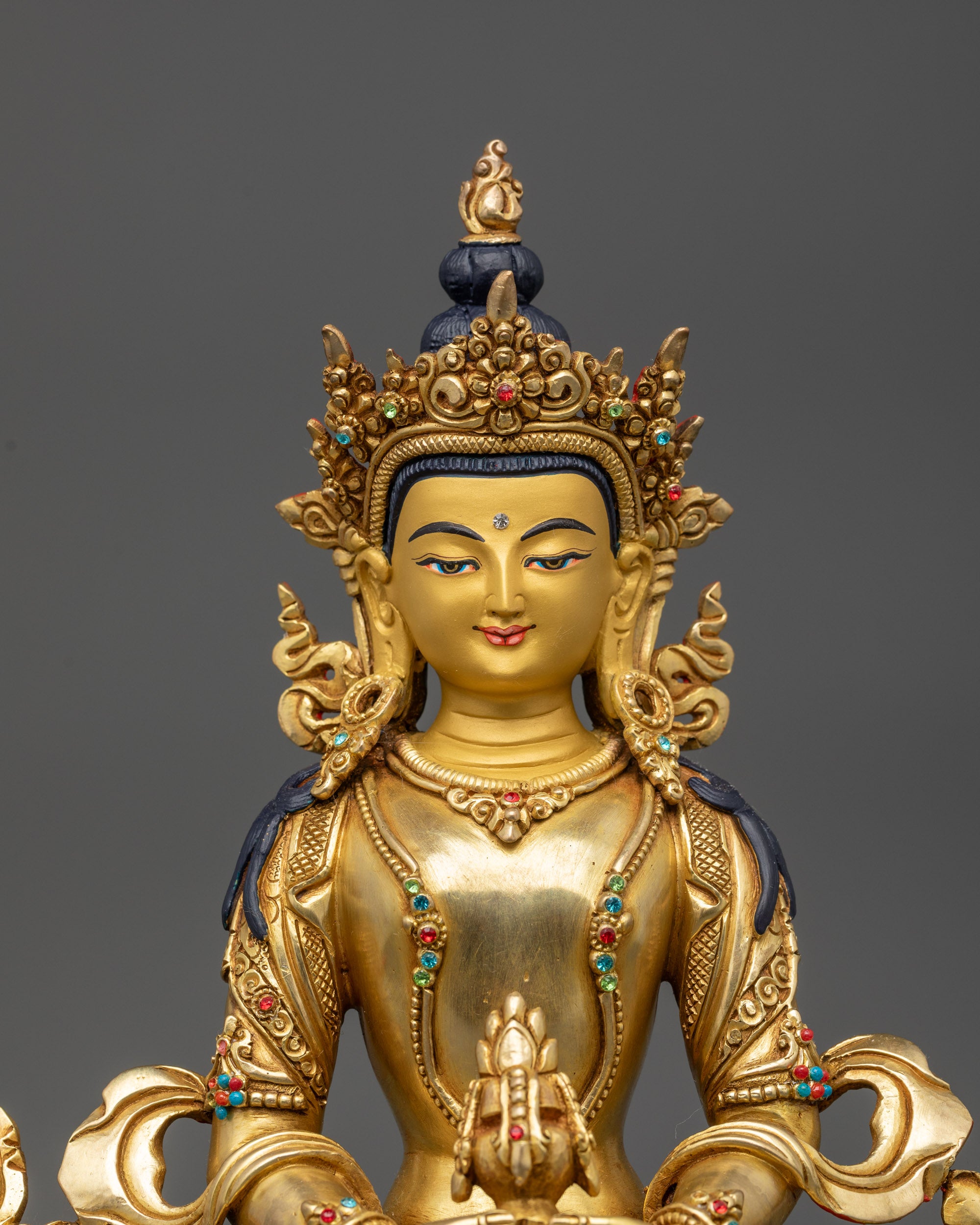 Close up Amitayus holding nectar vase with flowing robes and crown