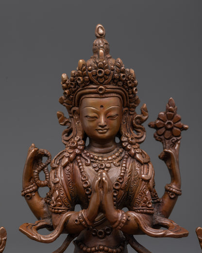 Close up Avalokiteshvara holding Wish-fulfilling gem with intricately carved garments