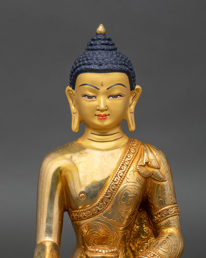 Close up Buddha face – serene gold-painted details by skilled Newari artisan from Nepal