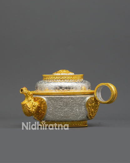 Close up Buddhist tea pot with gold-plated dragon-head spout from Torjang Set