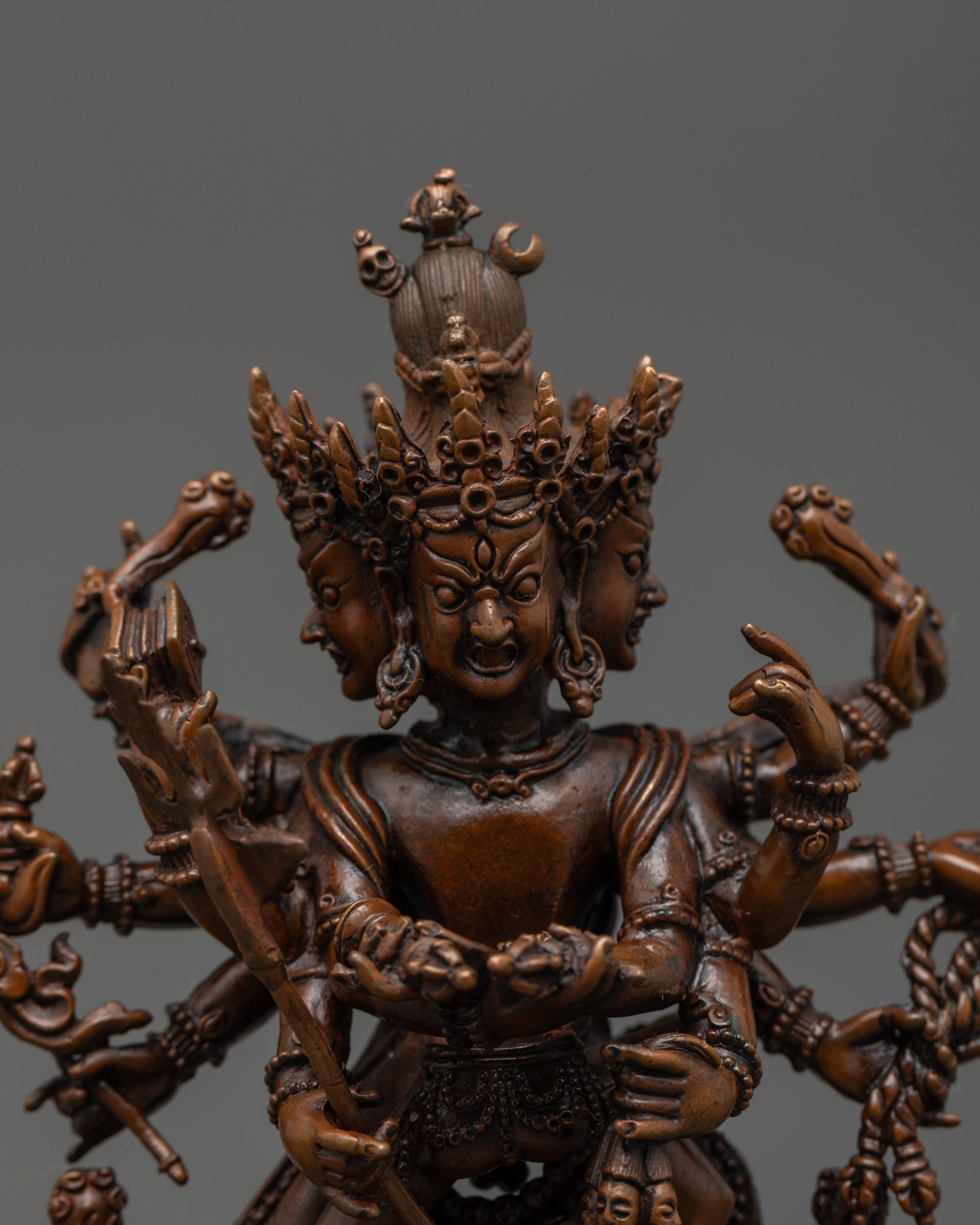 Close up Chakrasamvara head showing third eye and intricate carvings