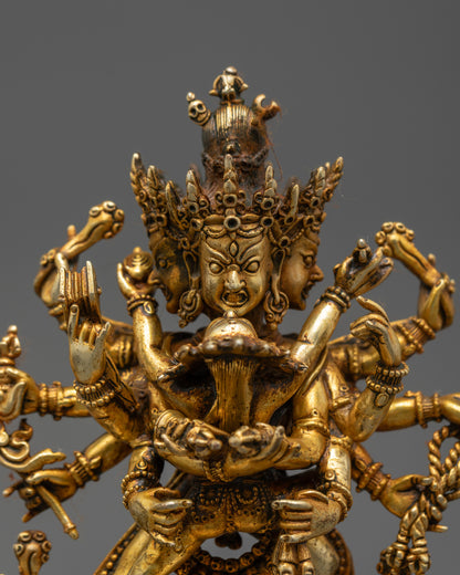Close up Chakrasamvara holding vajra and bell, gold-fire gilded deity details