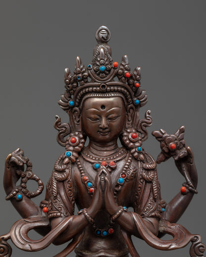 Close up Chenrezig Statue showing semi-precious stones and detailed hands