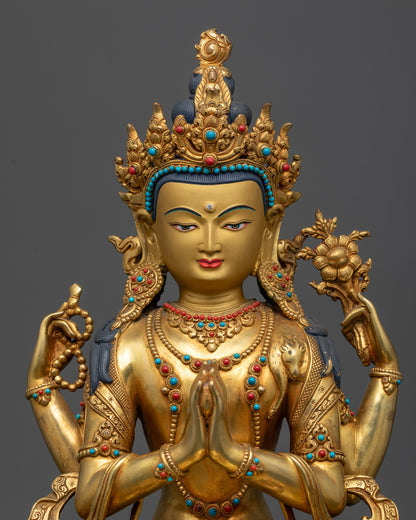 Close up Chenrezig statue lotus rosary jewel Nepalese Tibetan meditation figurine
