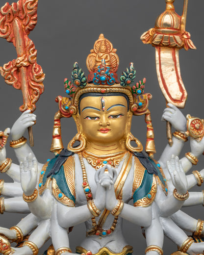 Close up: Close up of Chundi face, gold-painted, jeweled crown, hand-painted vibrant details
