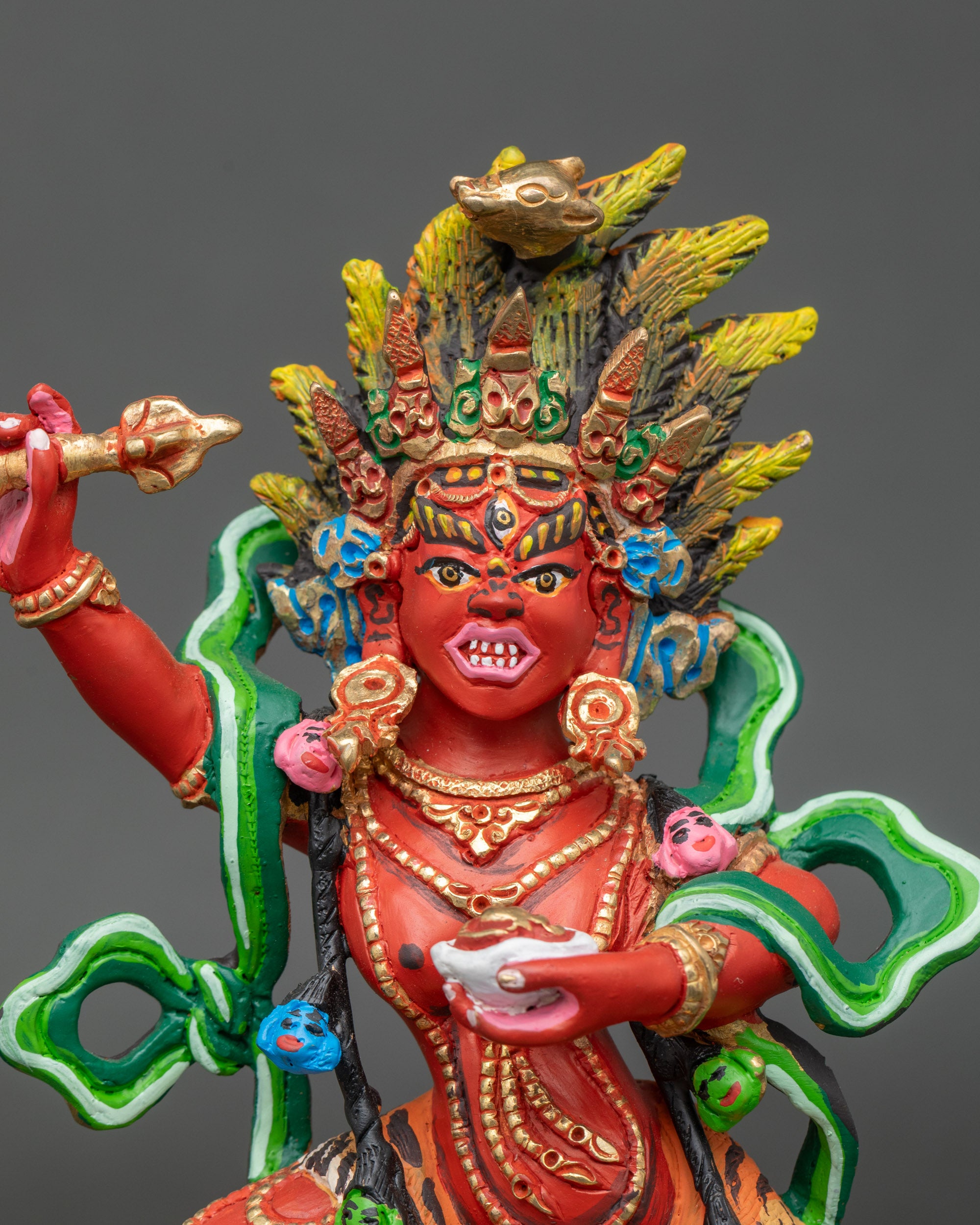 Close up Dorje Phagmo face five-pointed skull crown wrathful compassionate expression