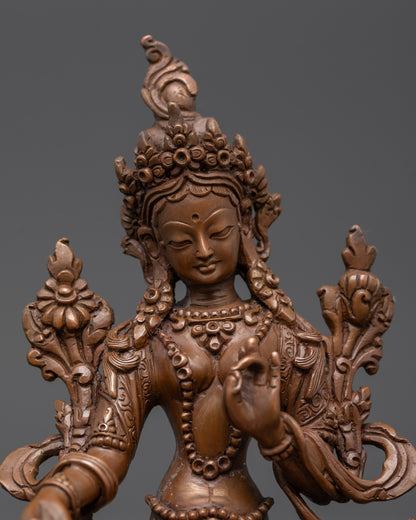 Close up Green Tara Statue showing intricate robe and jewelry details

