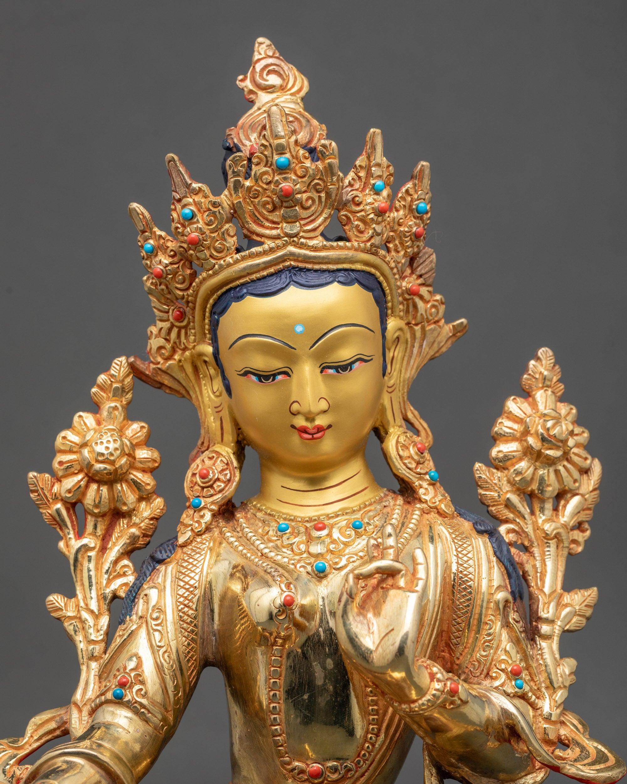 Close up Green Tara crown turquoise coral stones hand-painted Himalayan artwork