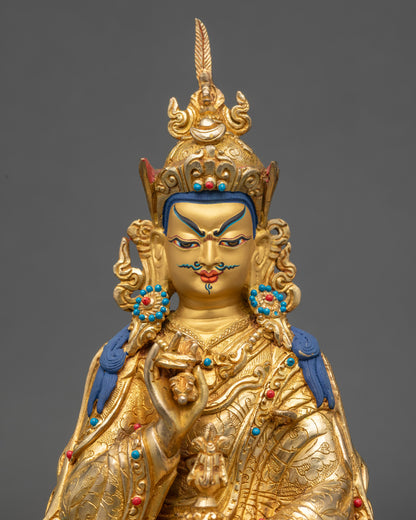 Close up Guru Tsokye Dorje gold-painted face semi-precious stones crown