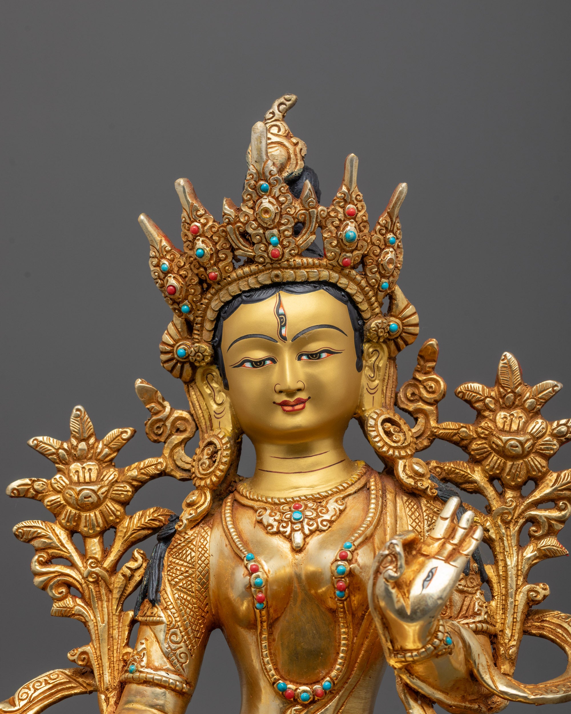 Close-up Hand-carved copper White Tara sculpture from Nepal