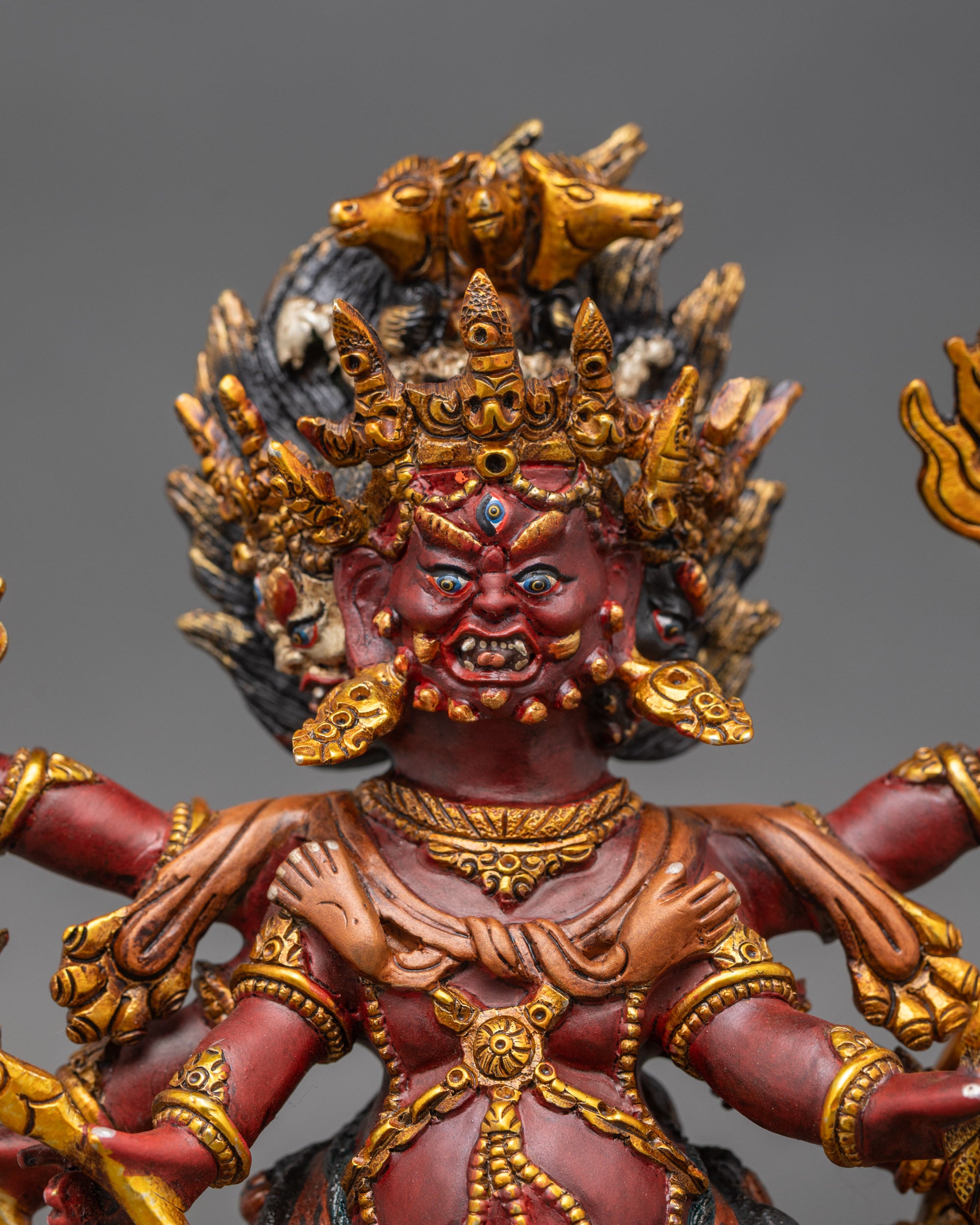 Close up Hayagriva face – fierce expression with intricate Himalayan copper detailing