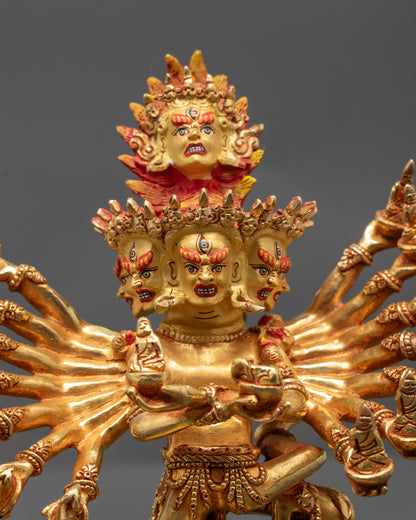 Close up Hevajra Yab Yum Statue showing semi-wrathful face with crown and jewelry
