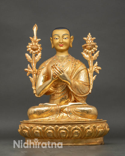 Close up Je Tsongkhapa statue gold-painted face, Newari handcrafted Tibetan Buddhist sculpture