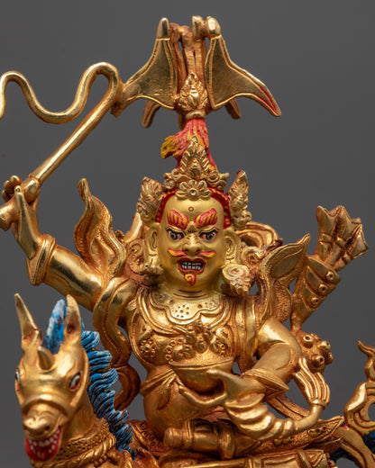 Close up King Gesar Statue showing detailed armor and sword staff craftsmanship
