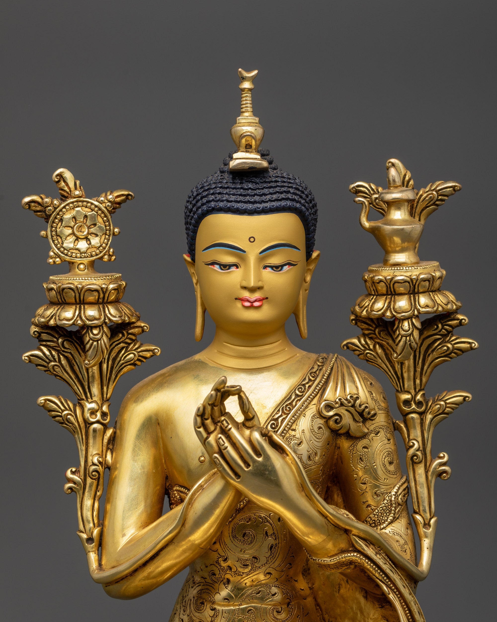 Close up Maitreya Buddha gold-gilded face with serene expression
