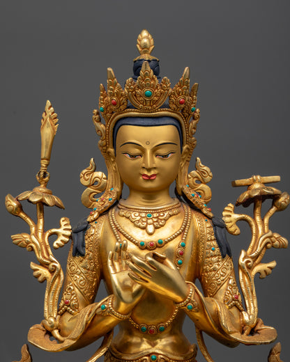Close up Manjushri Statue face and crown with semi-precious stones and fine carvings