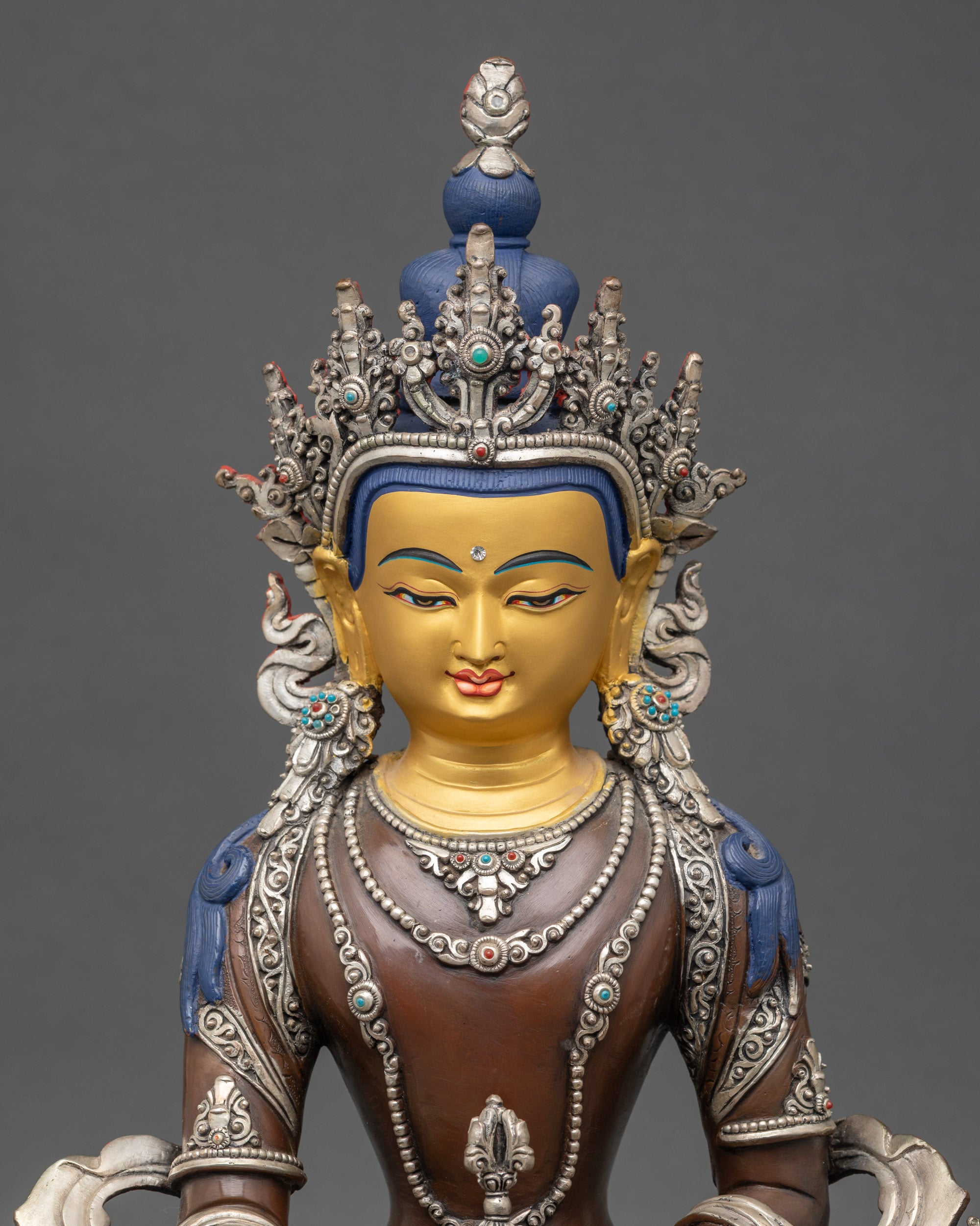 Close up Mitrugpa seven-jeweled crown dorje gold-painted face Himalayan metal art