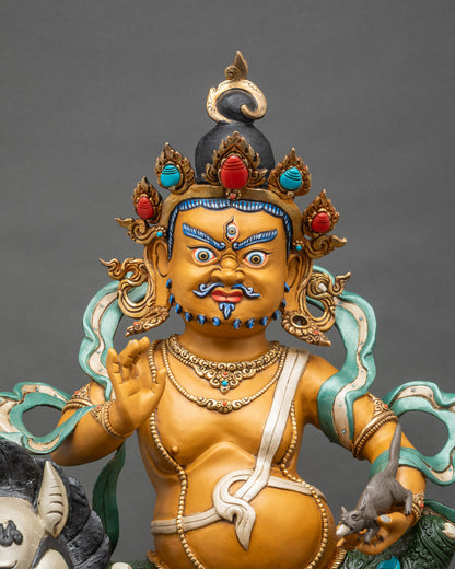 Close up Namtoshe wealth deity with jewel mongoose and victory banner