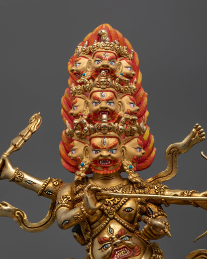 Close up Rahula face with skull crown and fierce expression

