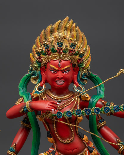 Close up Red Kurukulla copper body with third eye and five-skull crown details