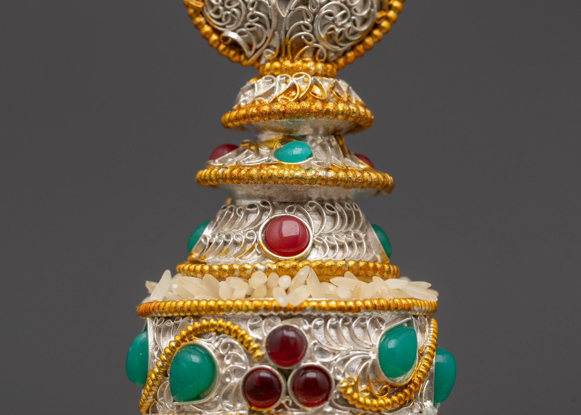 Close up Tibetan Mandala 3 inch showing turquoise ruby emerald gemstone details
