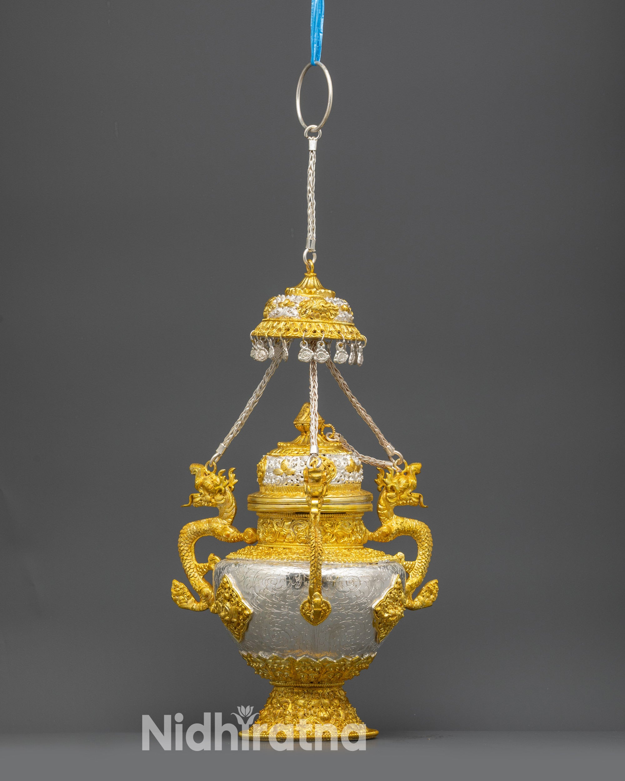 Close up Tibetan Sangbour ritual burner filigree pattern and perforated lid detail