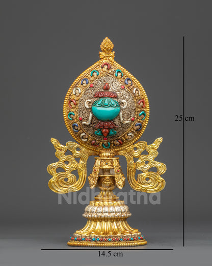 Close up Treasure Vase (Bumpa) from Ashtamangala set, gold-plated copper with filigree