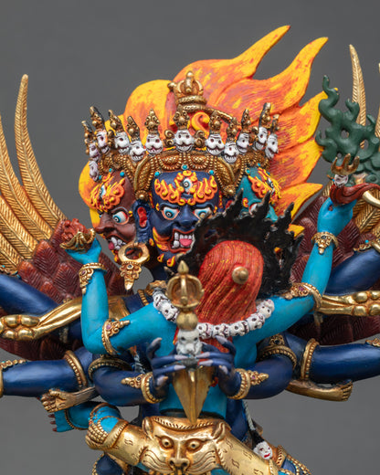 Close up Vajrakilaya statue showing wrathful deity iconography and sacred phurba dagger
