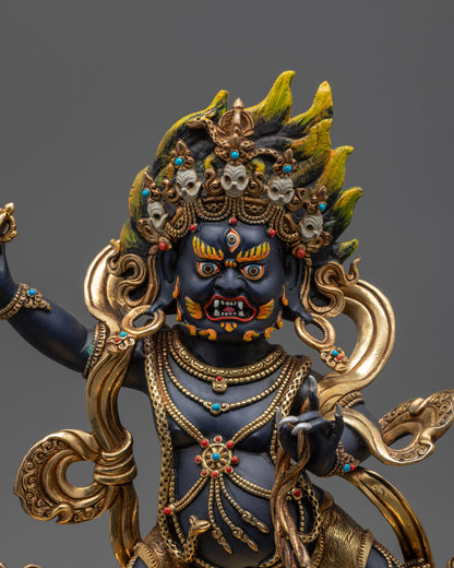 Close up Vajrapani Nepalese artisan statue holding vajra and lasso
