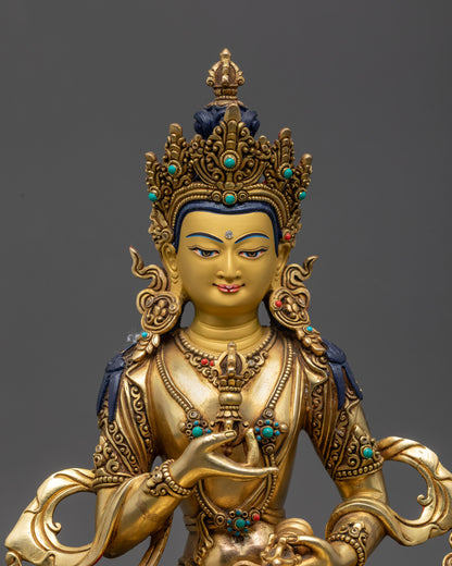 Close up Vajrasattva Statue calm expression with vajra bell and Five-Jeweled Crown