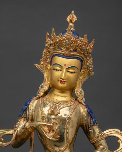 Close up Vajrasattva holding vajra and bell | handcrafted Nepalese copper sculpture