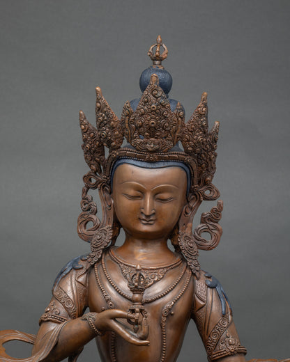 Close up Vajrasattva holding vajra and bell | handcrafted Newari statue from Patan Nepal