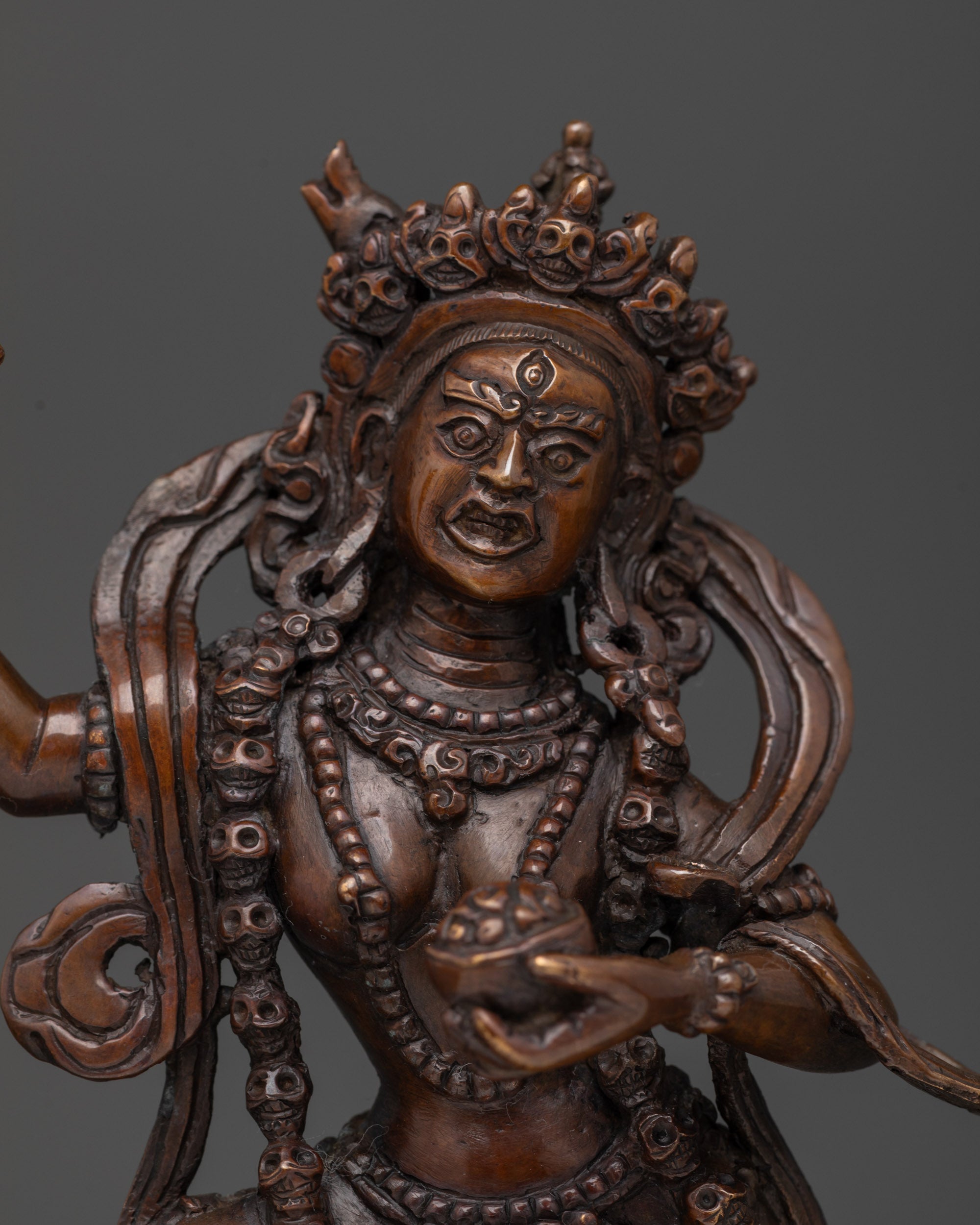 detailed lion-faced dakini figure